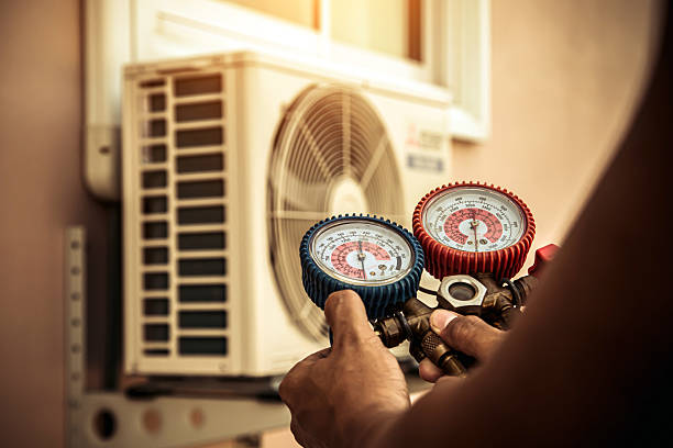 Professional Ac Installation technician working in Walpole, MA